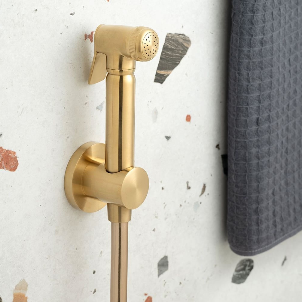 Lifestyle image of Vado Individual Brushed Gold Shattaf Handset